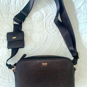 DKNY crossbody with attached AirPod case.